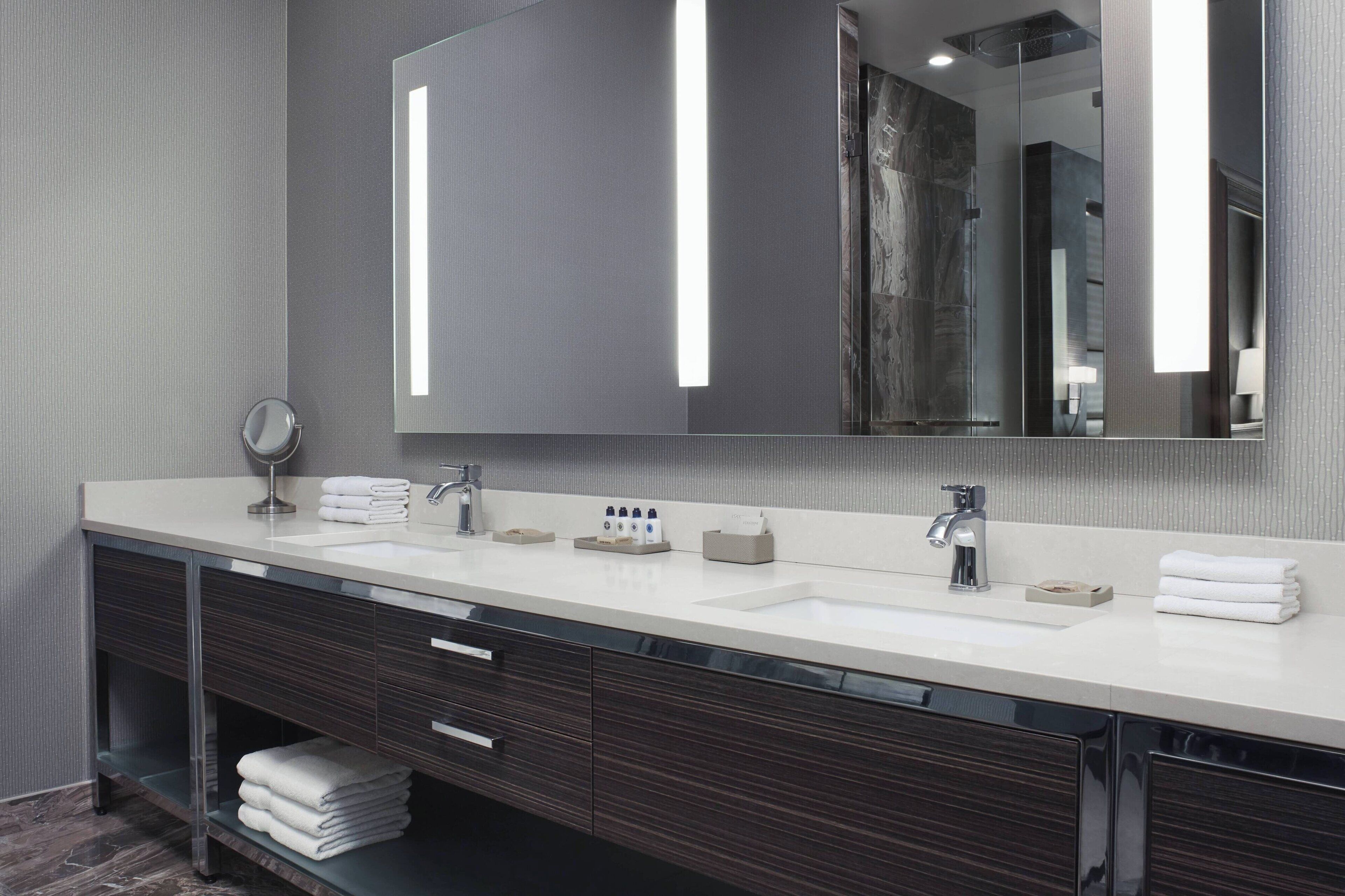 rainfall showerhead, designer toiletries, hair dryer, towels