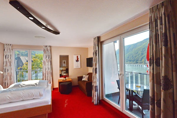 Deluxe Room, 1 Bedroom, Balcony | Premium bedding, in-room safe, desk, blackout drapes