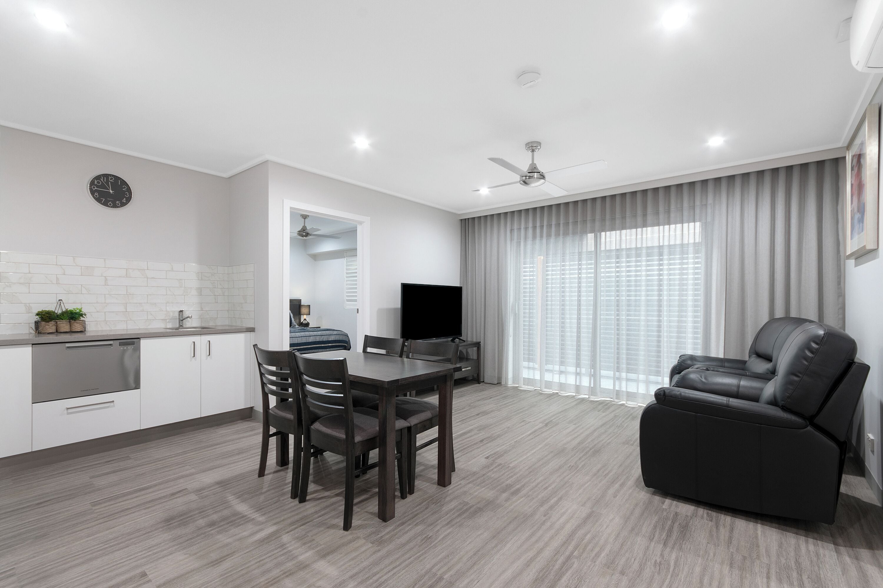 One Bedroom Apartment | Living area | 40-inch Smart TV with satellite channels