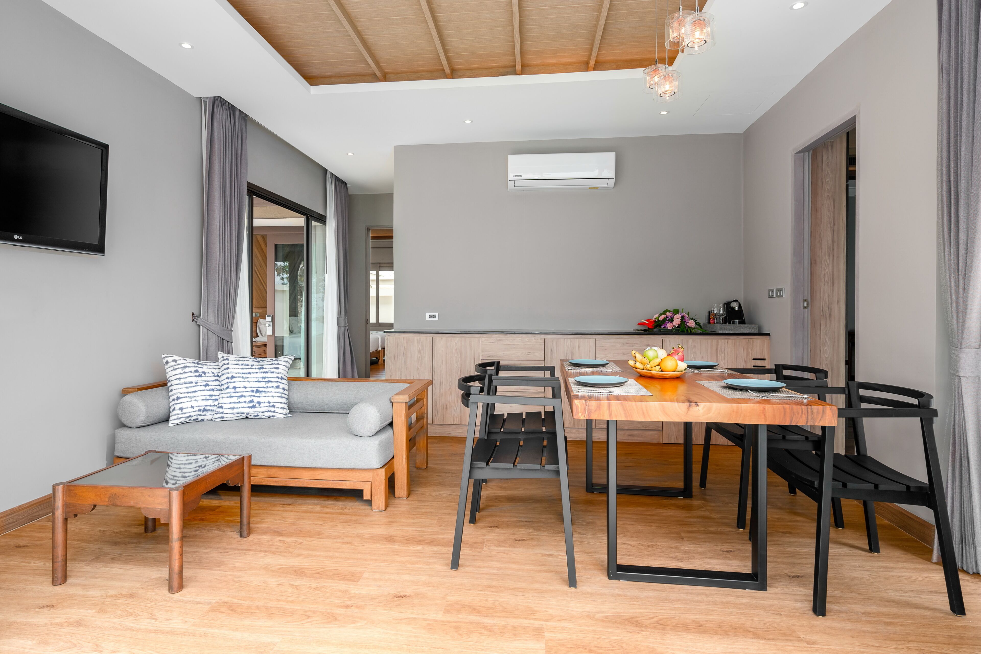 beachfront pool villa | living area | 21-inch flat-screen tv with cable channels, tv