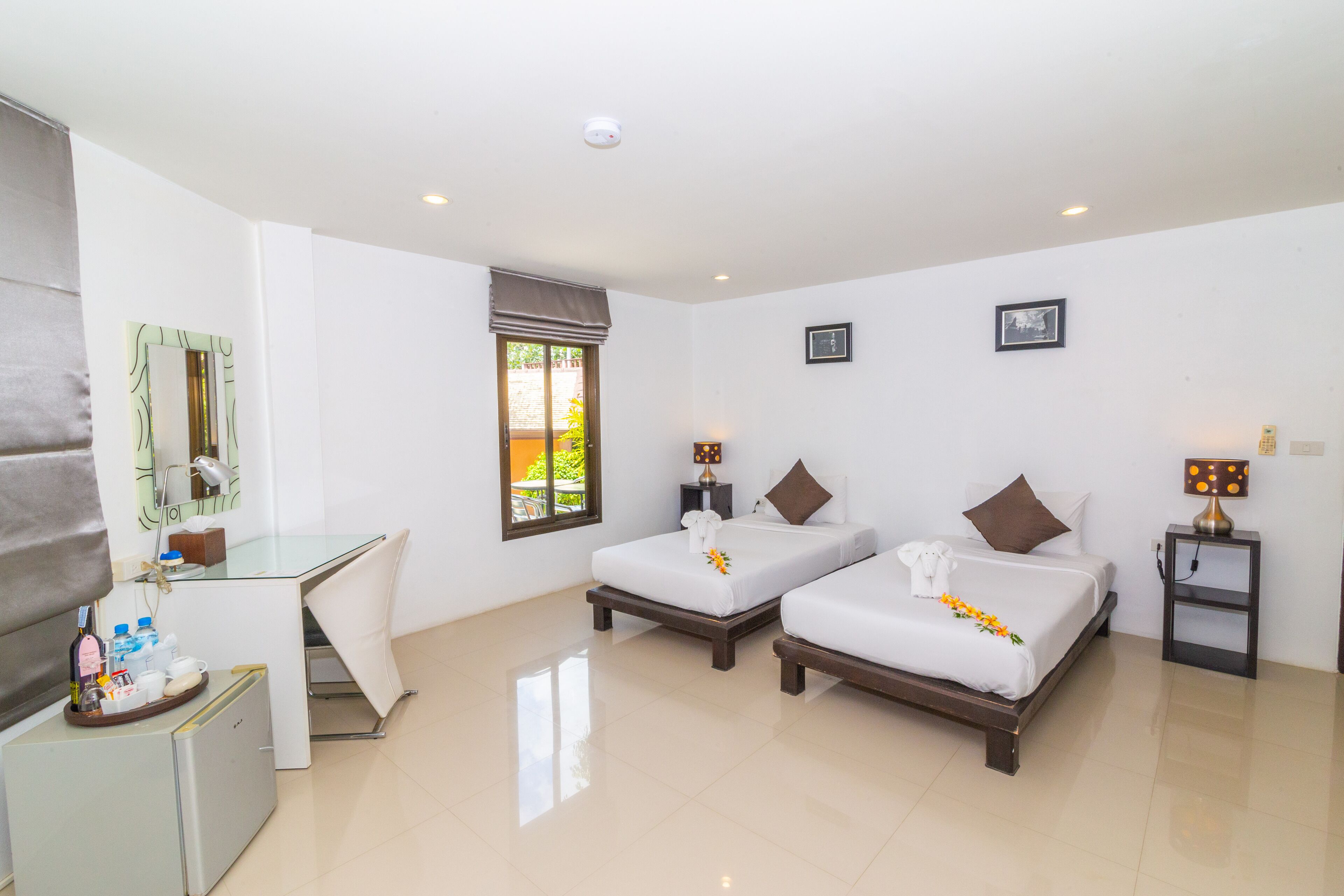 villa, 2 bedrooms, partial sea view | minibar, in-room safe, iron/ironing board, free cots/infant beds
