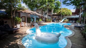 Outdoor pool, open 7:00 AM to 6:00 PM, pool umbrellas