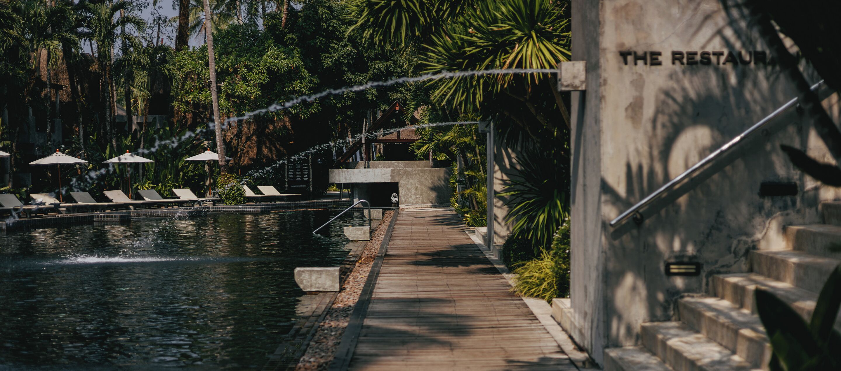outdoor pool, pool umbrellas, pool loungers