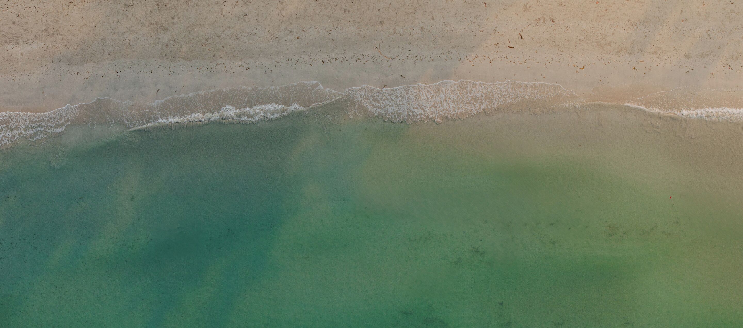 on the beach, sun-loungers, beach umbrellas, beach towels