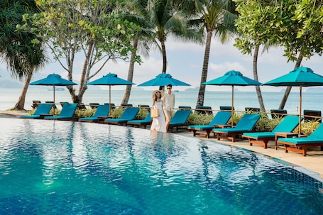 Outdoor pool, pool umbrellas, sun loungers