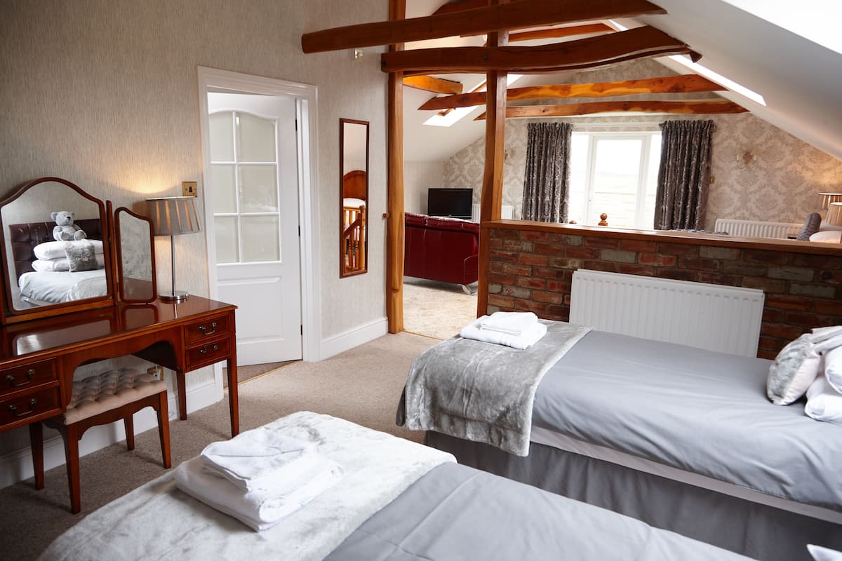 family room | desk, iron/ironing board, free wifi, bed sheets