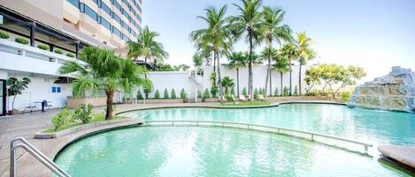 Outdoor pool, open 7:00 AM to 6:30 PM, pool loungers