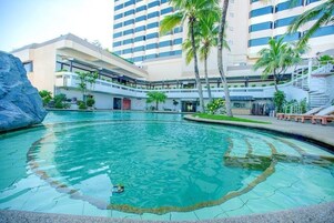 Outdoor pool, open 7:00 AM to 6:30 PM, sun loungers