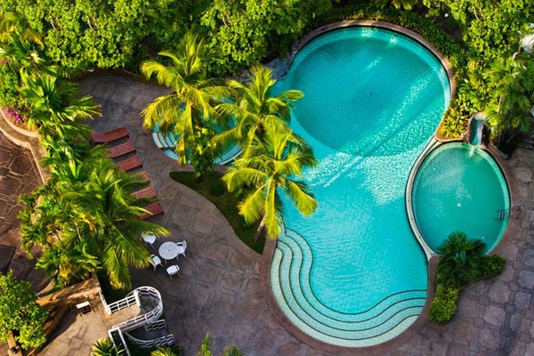 Outdoor pool, open 7:00 AM to 6:30 PM, pool loungers