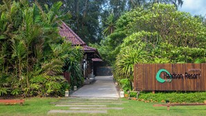 A pathway leading to a building with a sign reading "Chieson Resort". - Haadson Resort (Takua Pa)