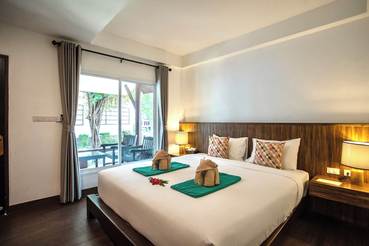 Family Room, Balcony, Garden View | 1 bedroom, in-room safe, desk, blackout drapes