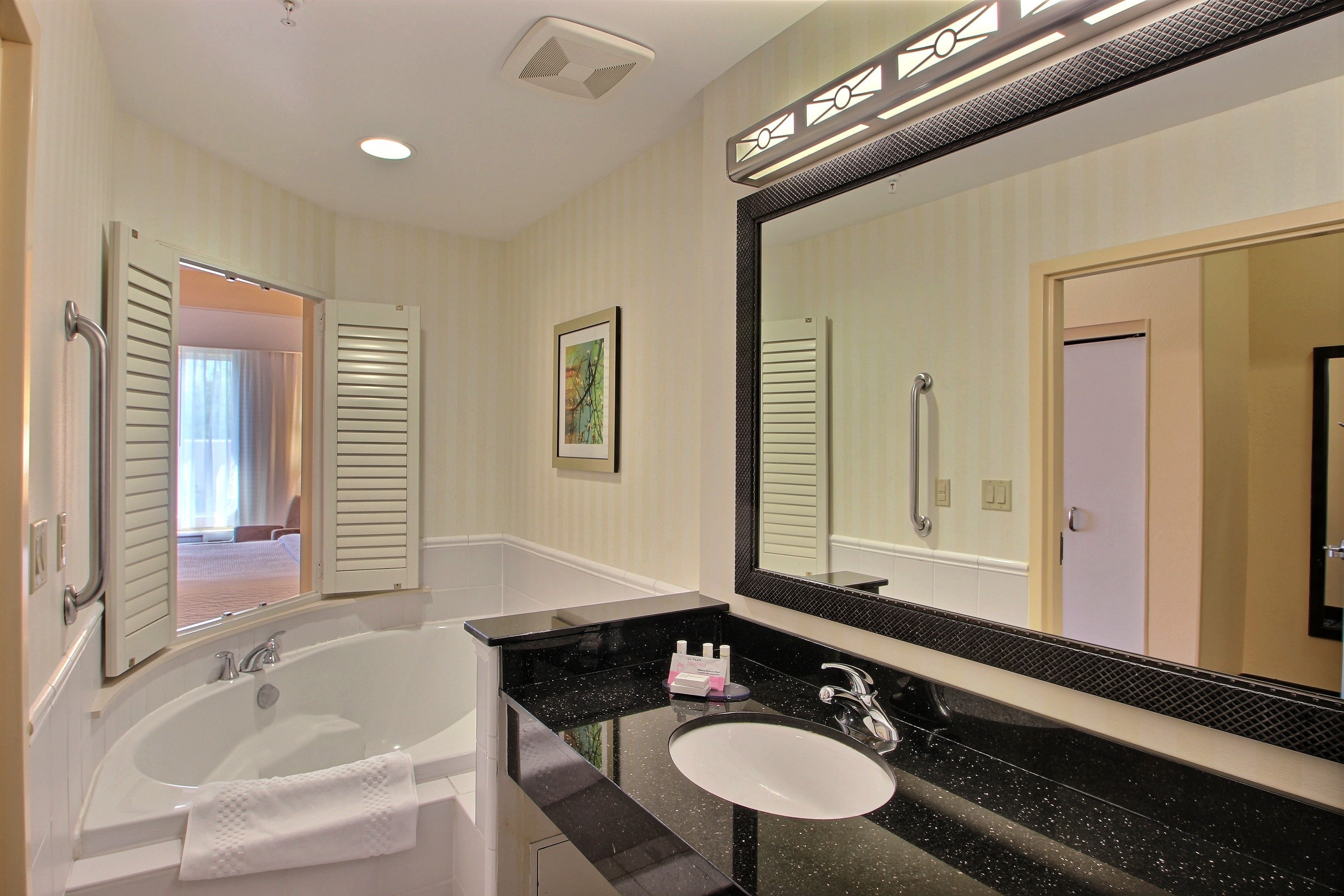 room, 1 king bed | bathroom | free toiletries, hair dryer, towels