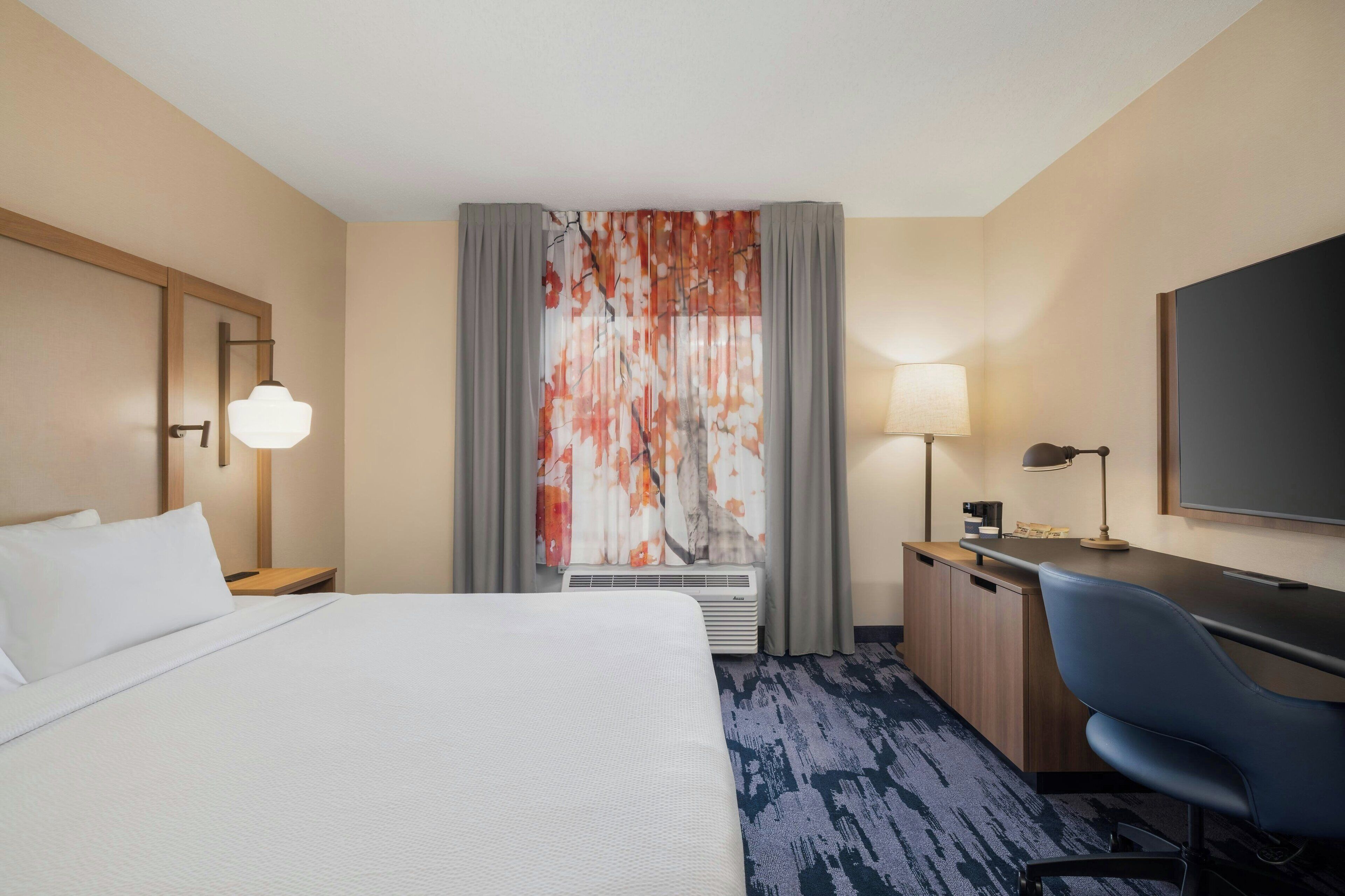 Room, 1 King Bed | In-room safe, desk, iron/ironing board, free cots/infant beds