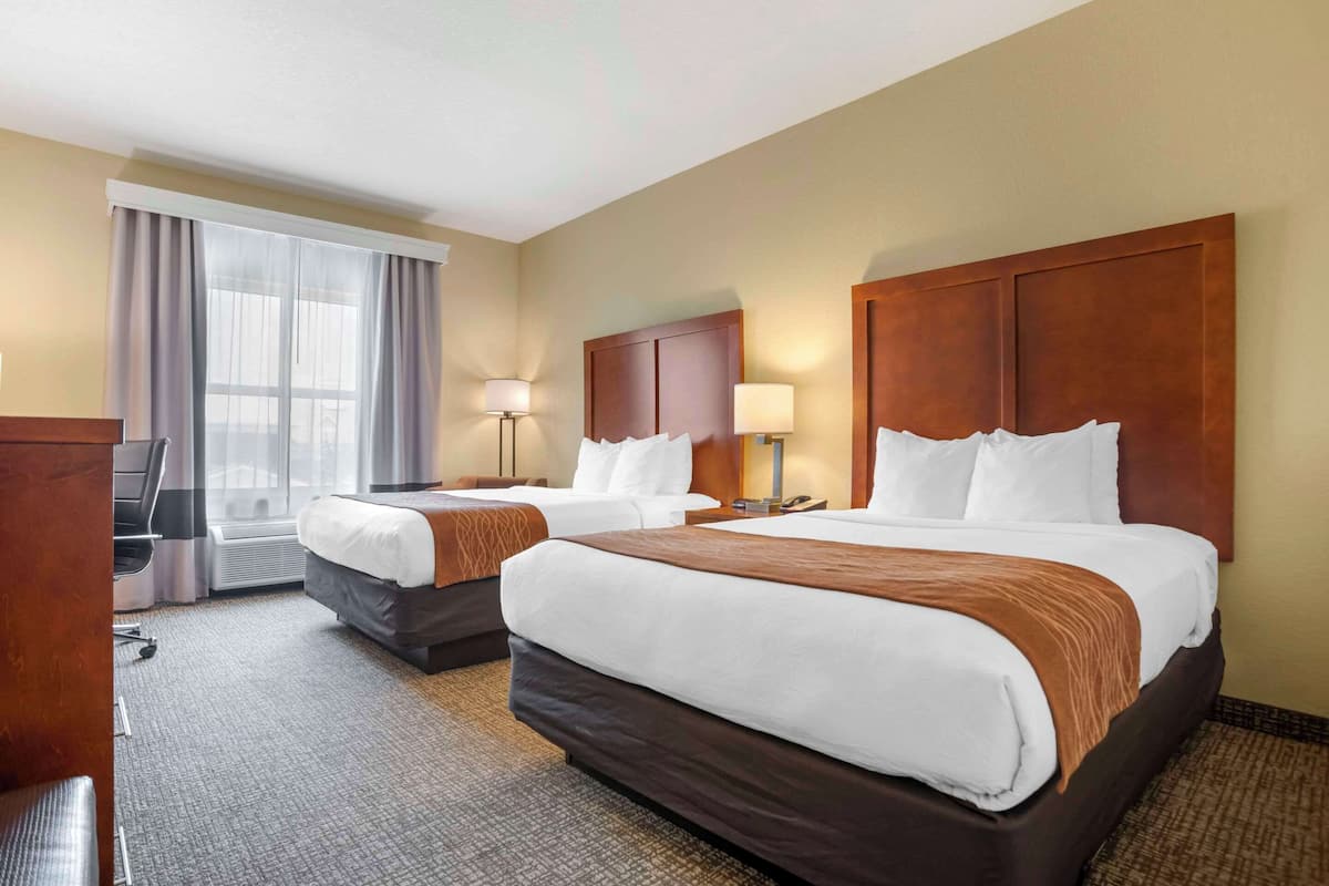 desk, laptop workspace, iron/ironing board, travel cot