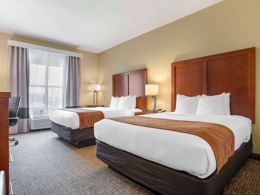 Desk, laptop workspace, iron/ironing board, travel crib