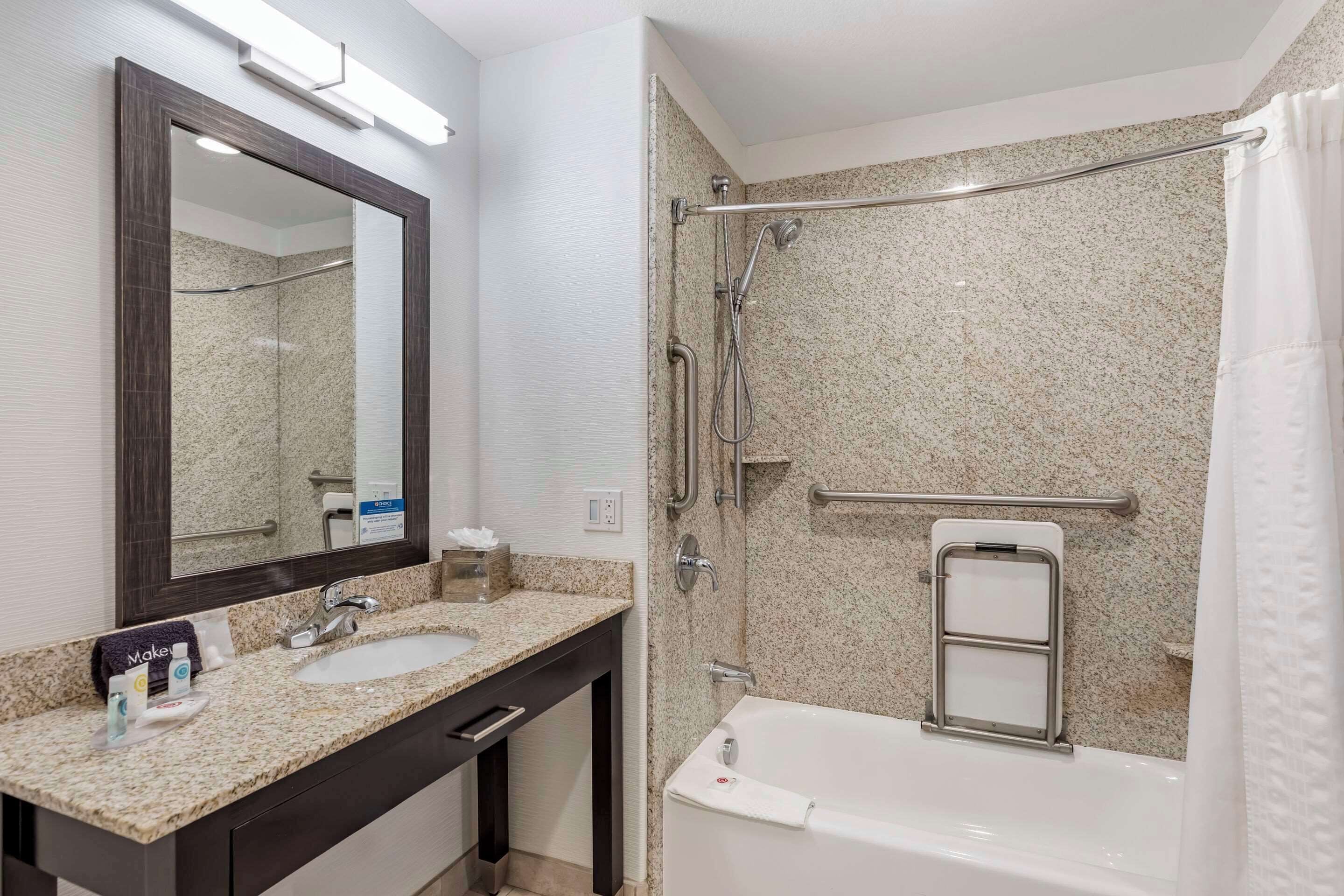 hydromassage showerhead, free toiletries, hair dryer, slippers