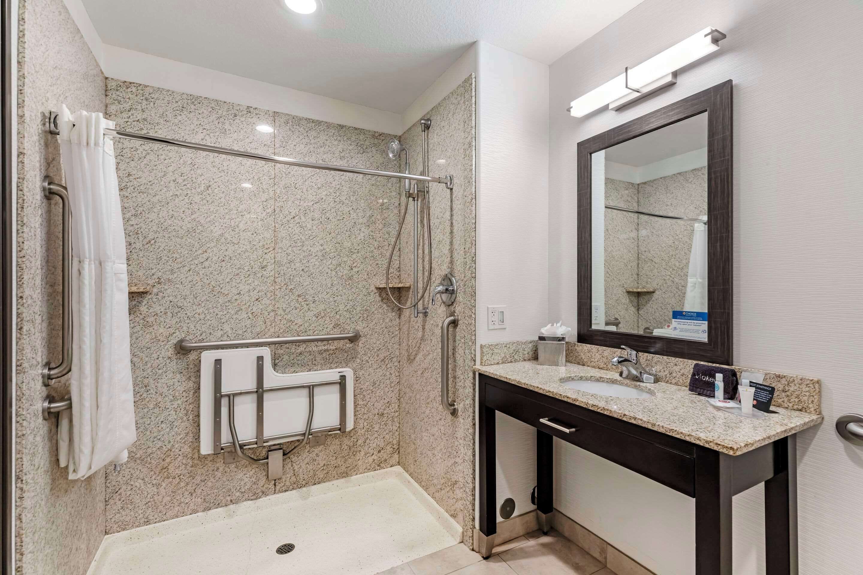 room, 2 queen beds, accessible, non smoking | bathroom | hydromassage showerhead, free toiletries, hair dryer, slippers