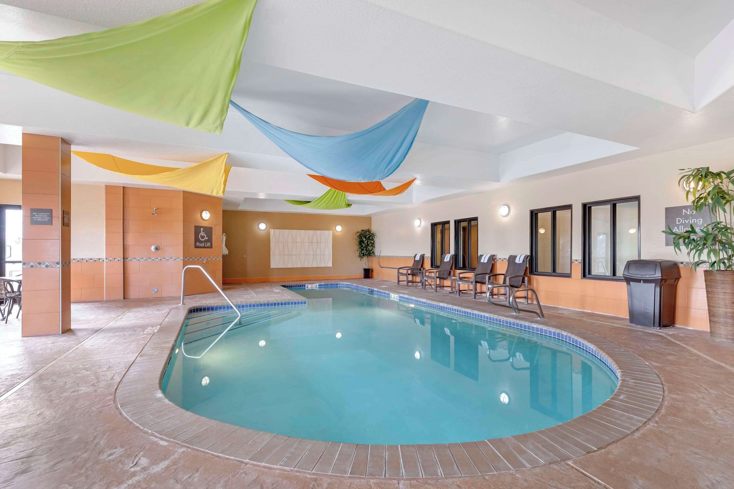 indoor pool, open 8 am to 10 pm, pool loungers