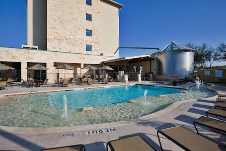 Indoor pool, outdoor pool, open 6 AM to 10 PM, pool umbrellas