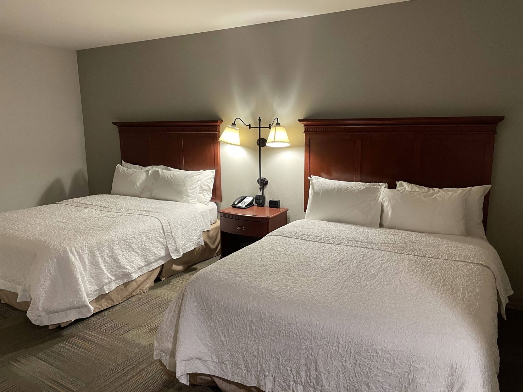 Select Comfort beds, desk, blackout drapes, iron/ironing board