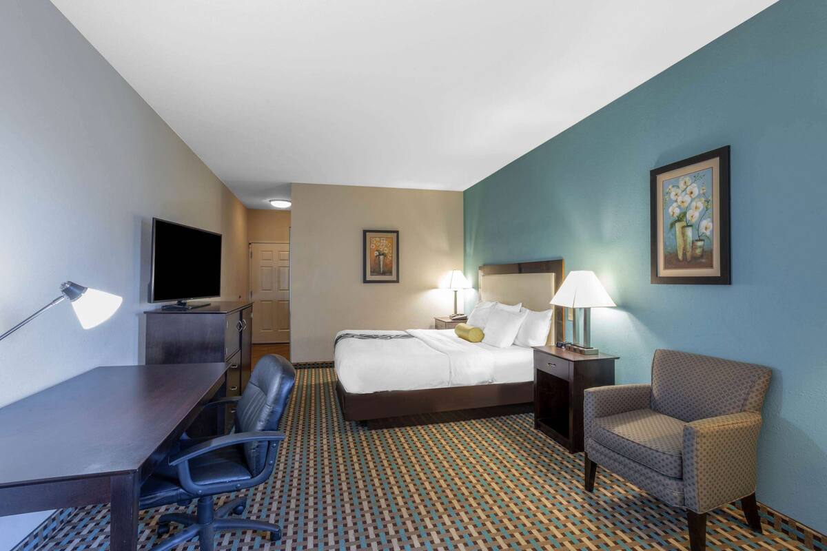 pillow-top beds, desk, laptop workspace, iron/ironing board