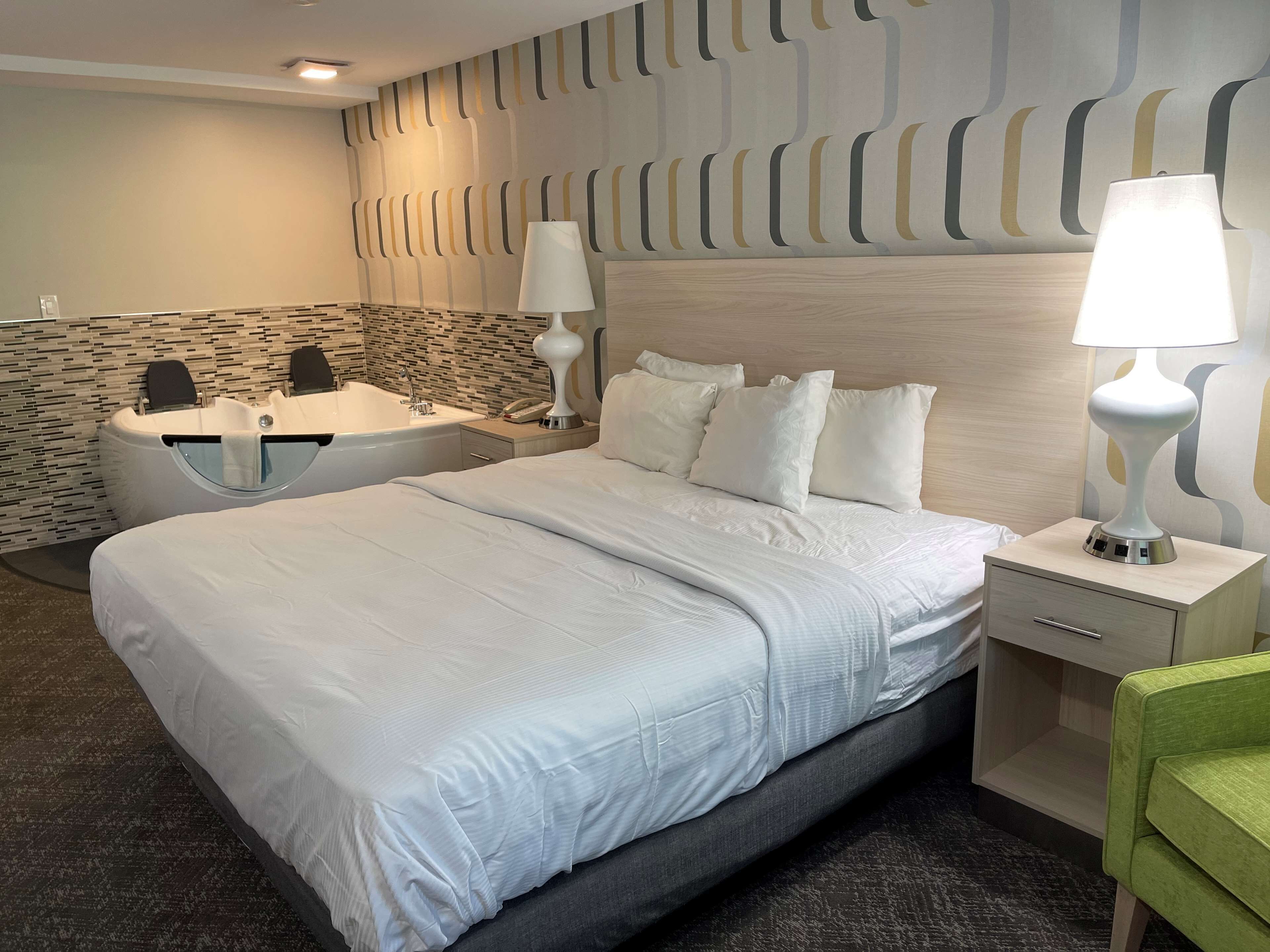 standard room, 1 king bed, non smoking, jetted tub | iron/ironing board, free cots/infant beds, rollaway beds, free wifi