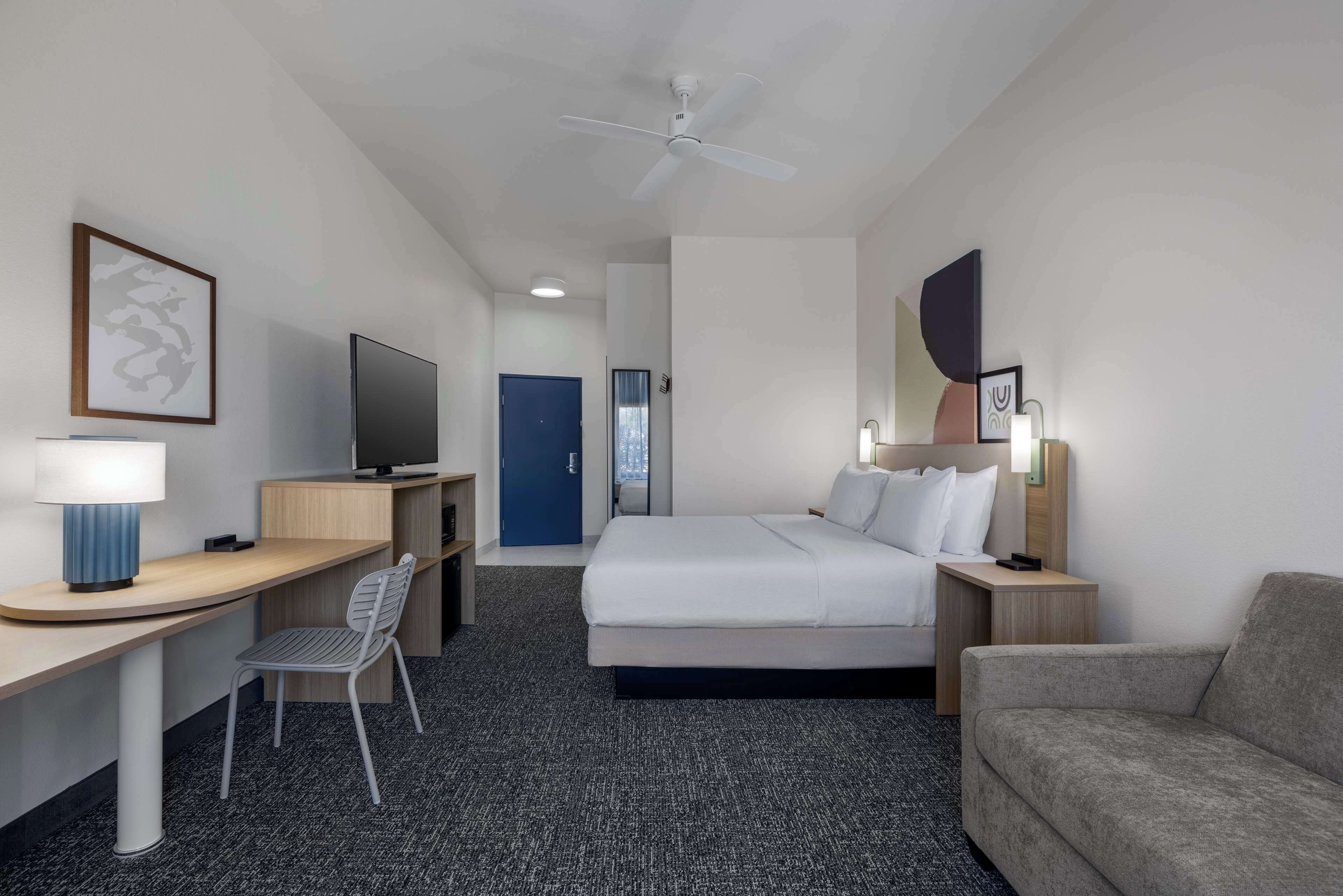 desk, laptop workspace, blackout curtains, iron/ironing board