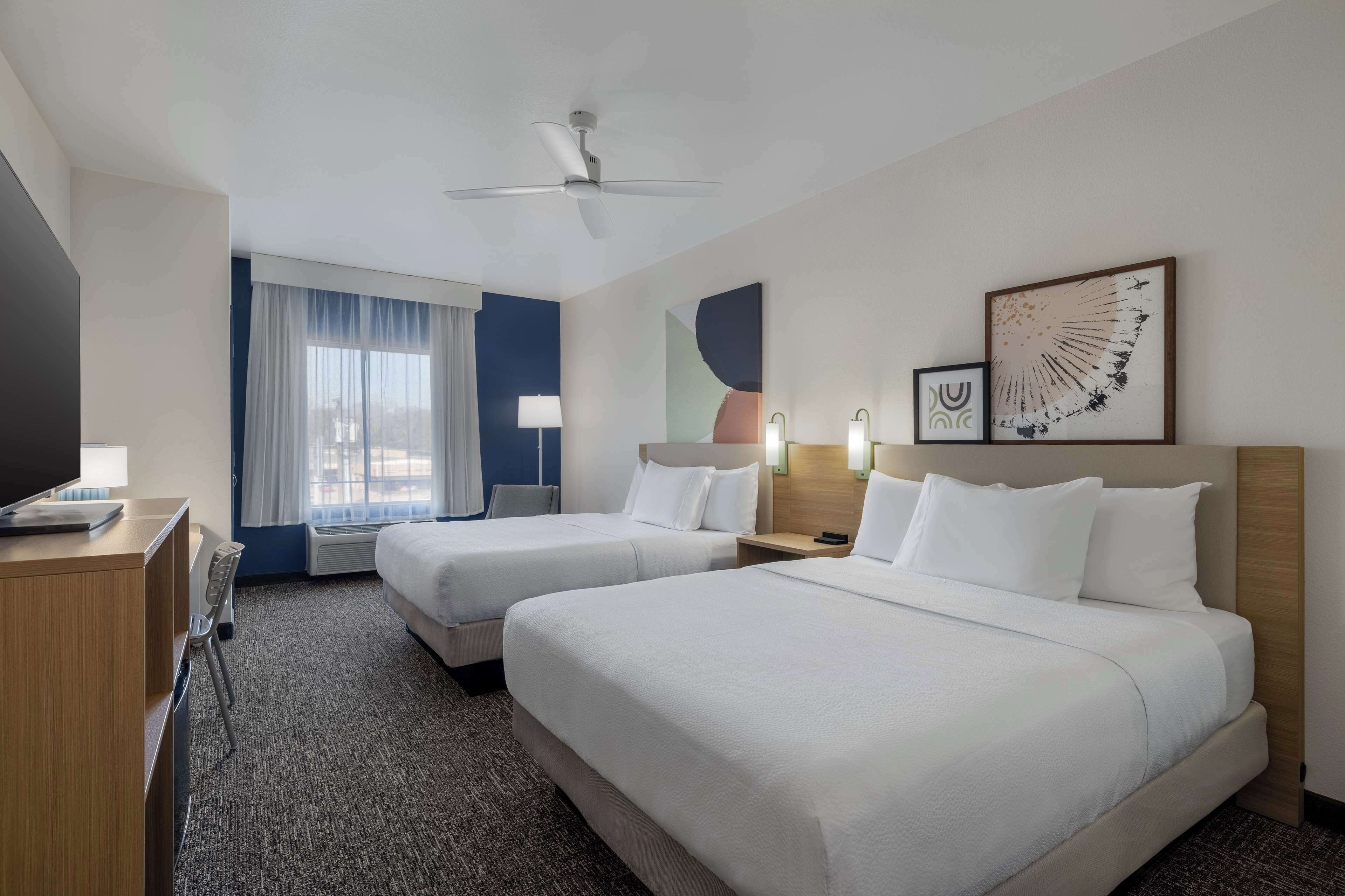 desk, laptop workspace, blackout curtains, iron/ironing board