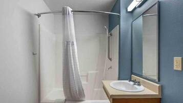 Combined shower/tub, hair dryer, towels, soap