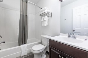 Combined shower/bathtub, hair dryer, towels, soap