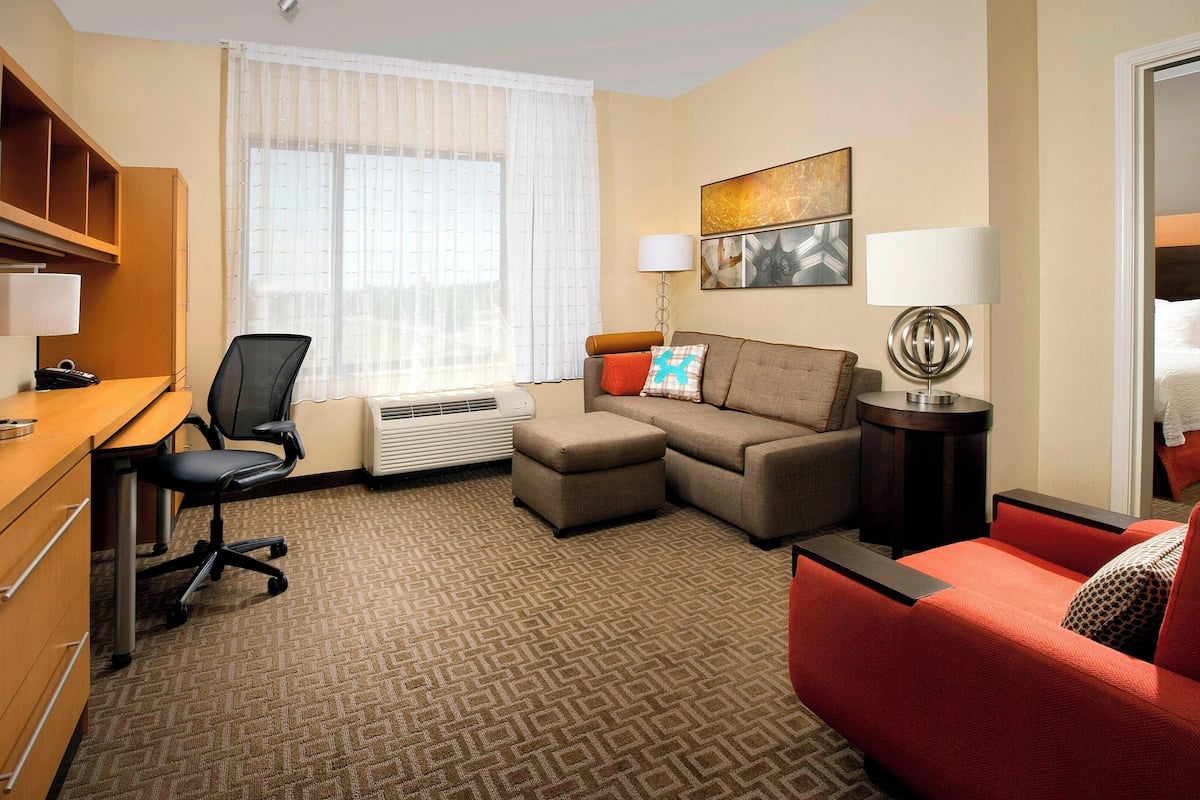 Suite, 1 Bedroom | 1 bedroom, desk, blackout curtains, iron/ironing board