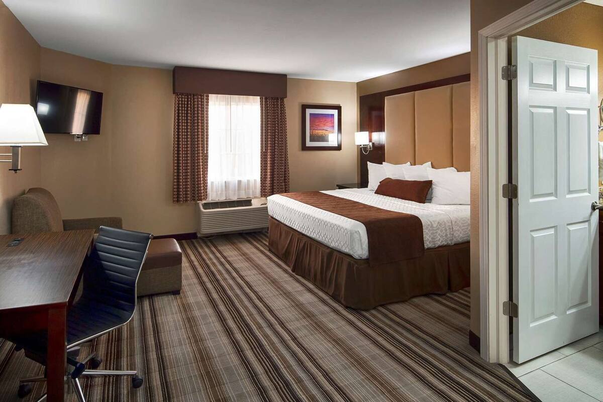 Hypo-allergenic bedding, pillow-top beds, desk, laptop workspace