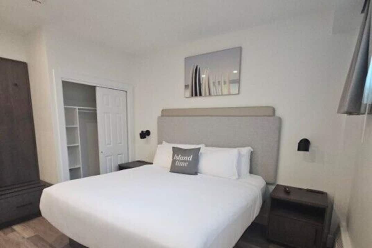Superior Suite | Down comforters, Select Comfort beds, desk, laptop workspace