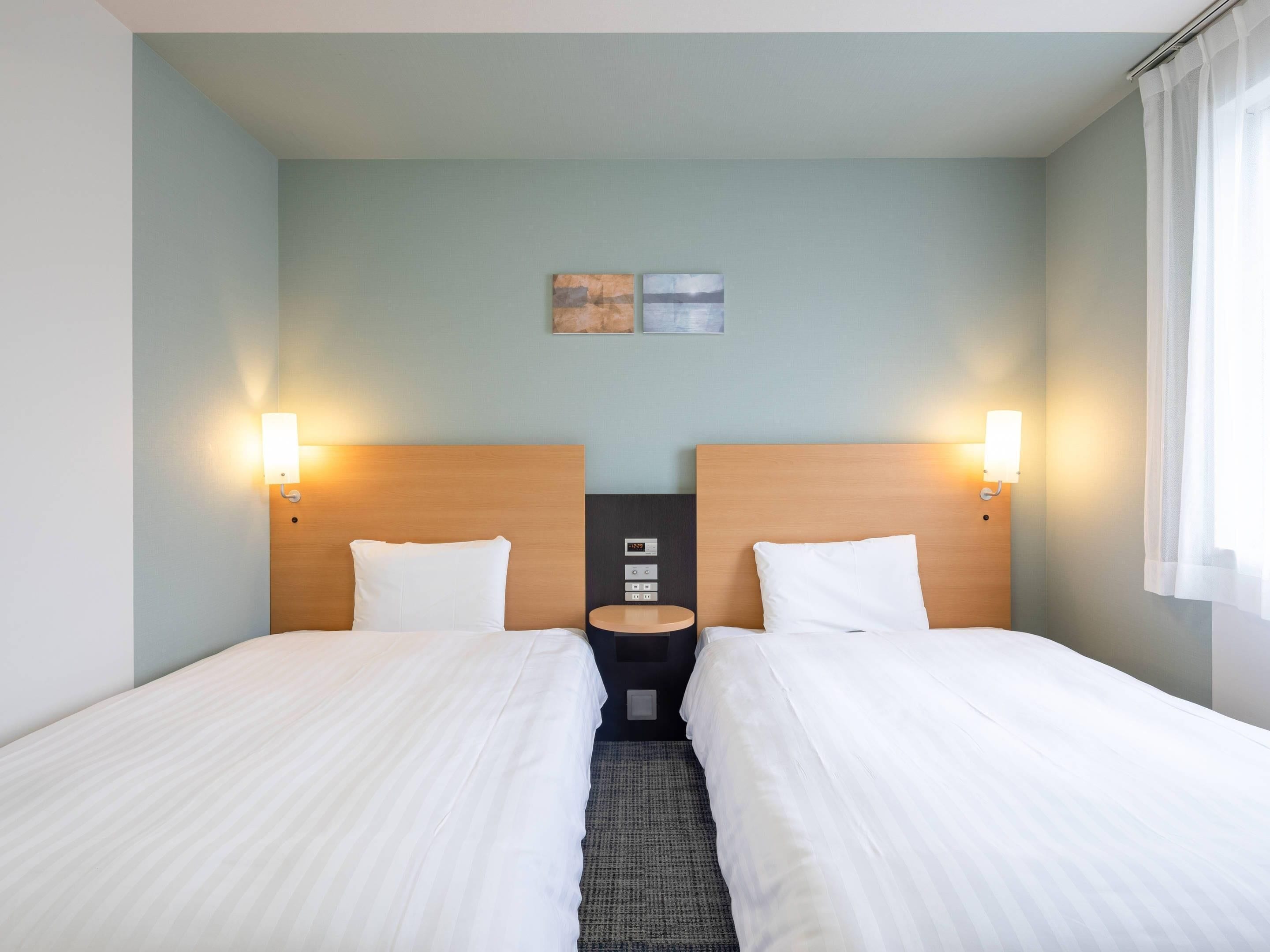 Habitació, 2 llits individuals, no fumadors | Escriptori, cortines opaques i habitacions insonoritzades 