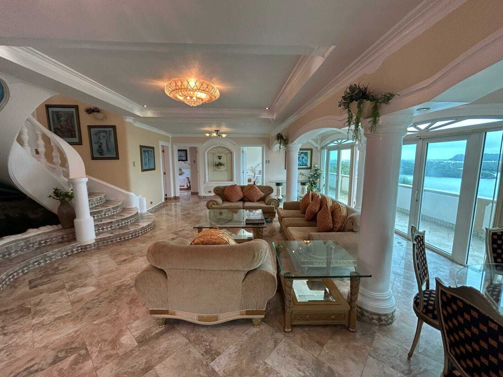 Royal Suite, 3 Bedrooms | Living area | 40-inch Smart TV with cable channels