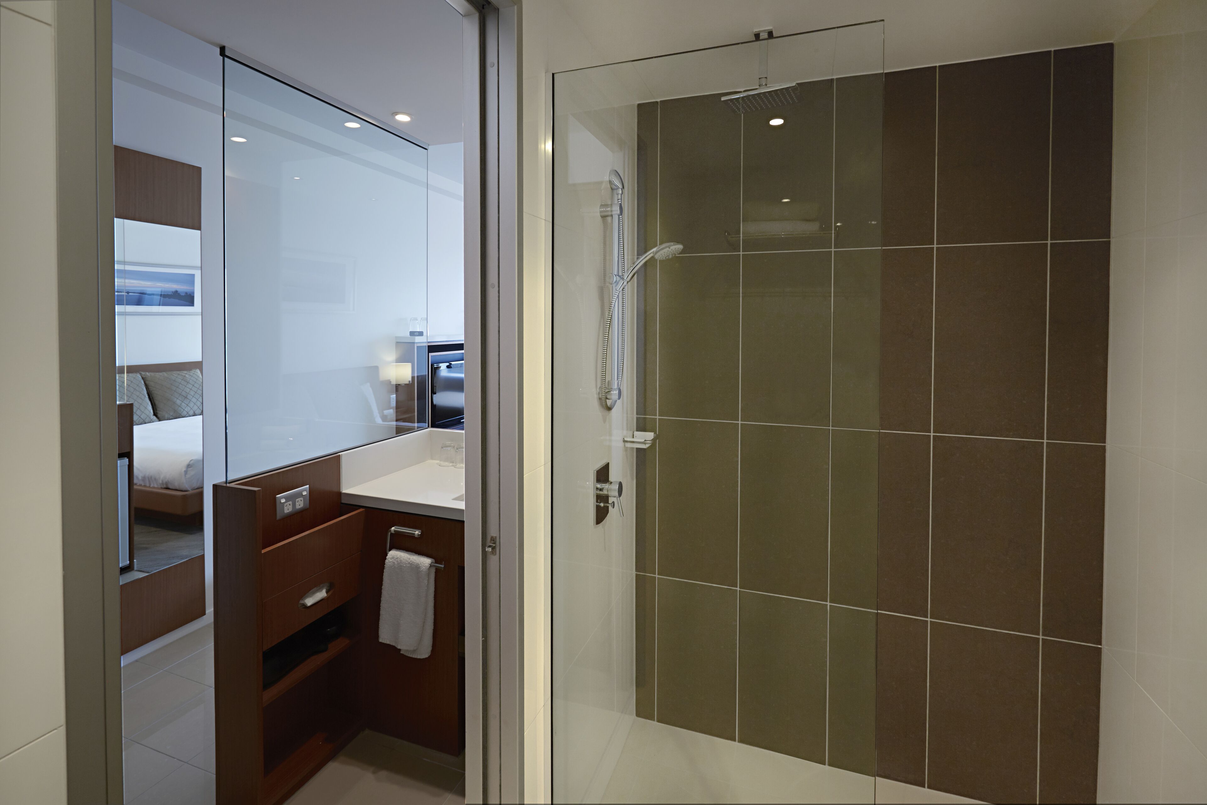 shower, eco-friendly toiletries, hair dryer, towels