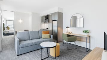 Deluxe One Bedroom Spa Apartment | Living area | 32-inch LCD TV with digital channels, TV, Netflix