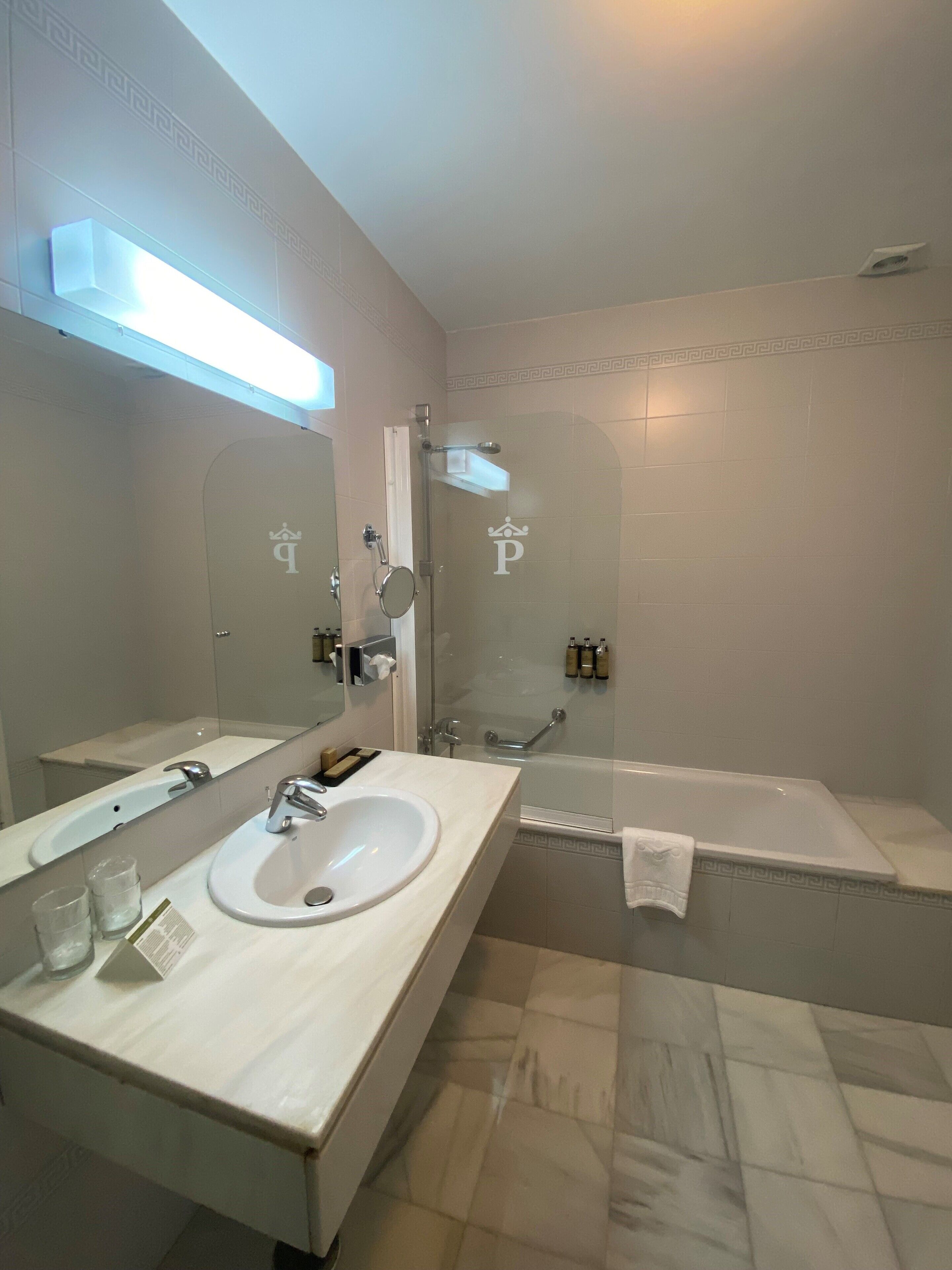 superior double room | bathroom | bathtub, free toiletries, hair dryer, towels