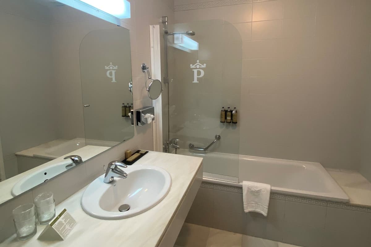 superior double room | bathroom | bathtub, free toiletries, hair dryer, towels
