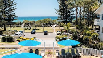 Outdoor pool, pool umbrellas, sun loungers