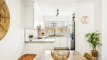 Full-size fridge, microwave, stovetop, toaster