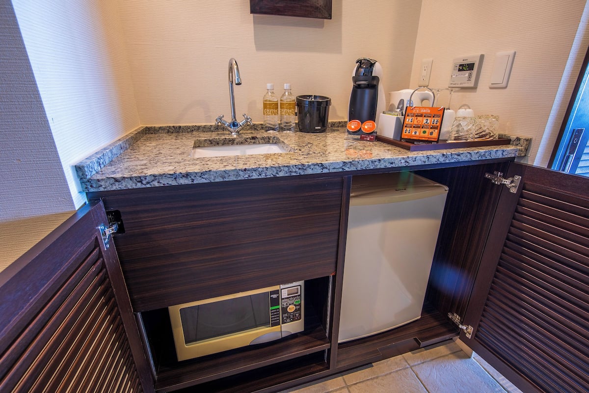 condo building premium suite twin (capacity 2 people) | private kitchen | fridge, microwave, coffee/tea maker, electric kettle