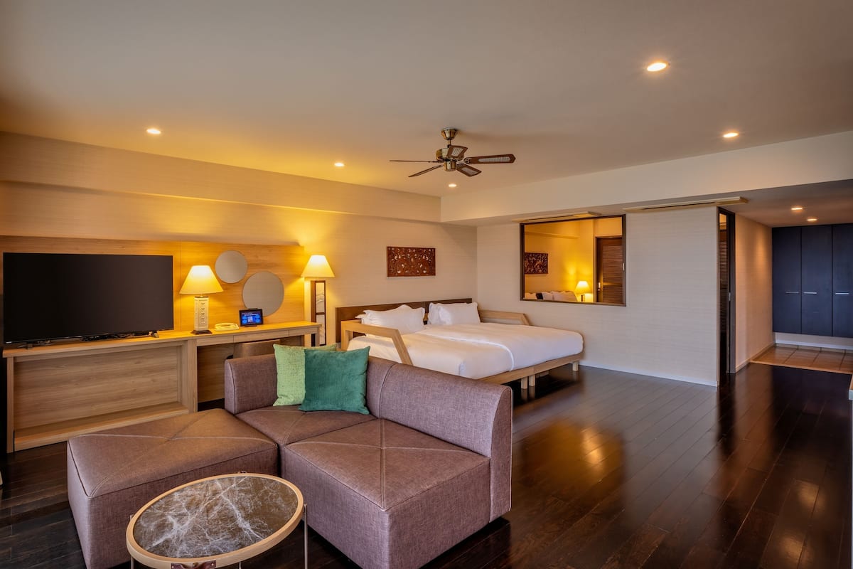 suite in hotel bldg | 2 bedrooms, down duvets, in-room safe, desk