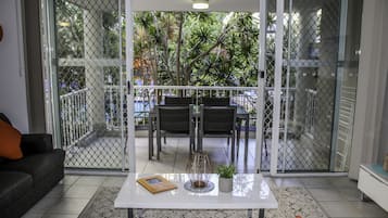 Three Bedroom Apartment  | Living area | Flat-screen TV, DVD player