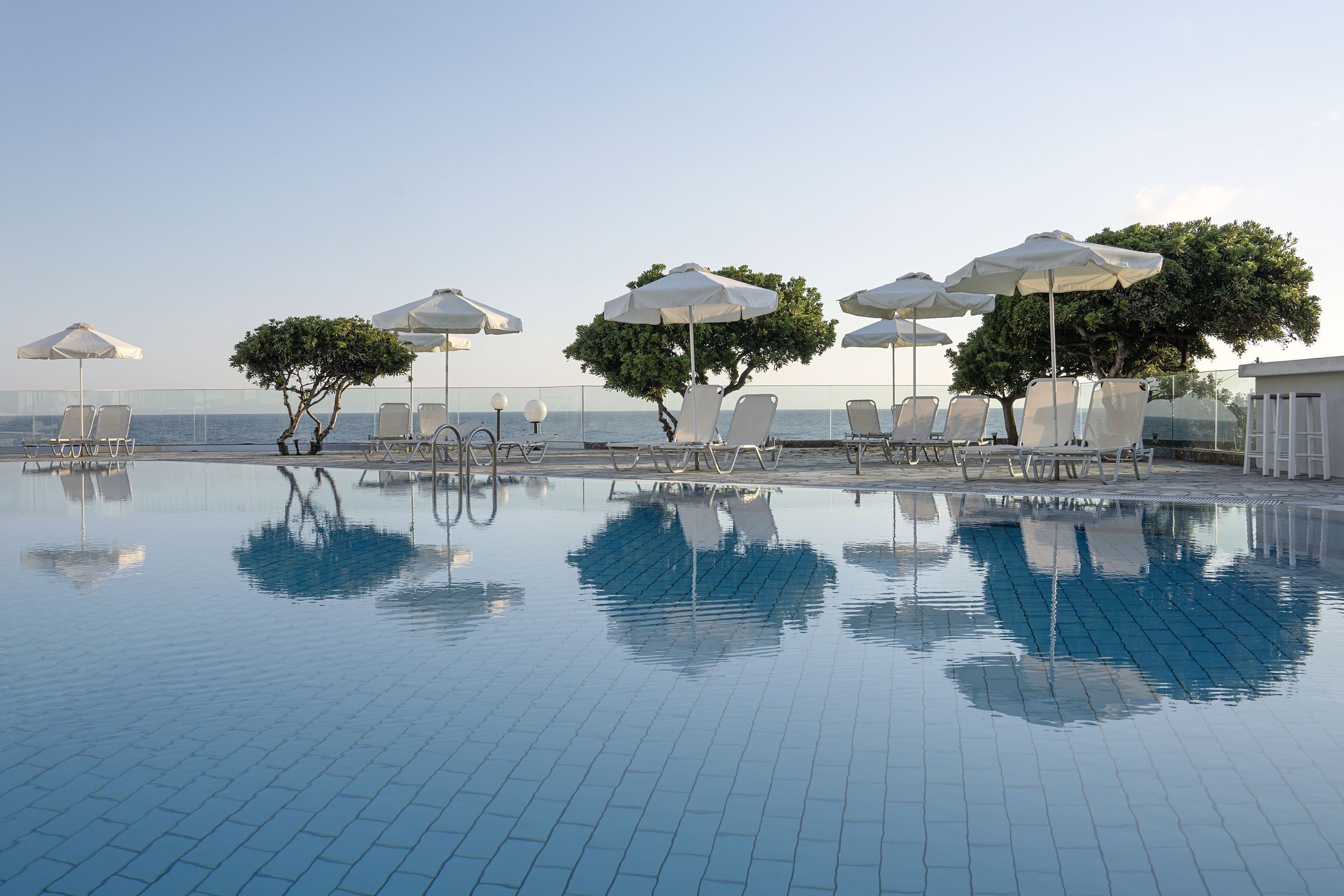 outdoor pool, pool umbrellas, pool loungers
