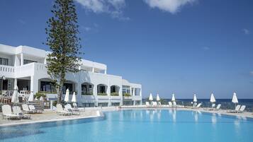 Outdoor pool, pool umbrellas, sun loungers