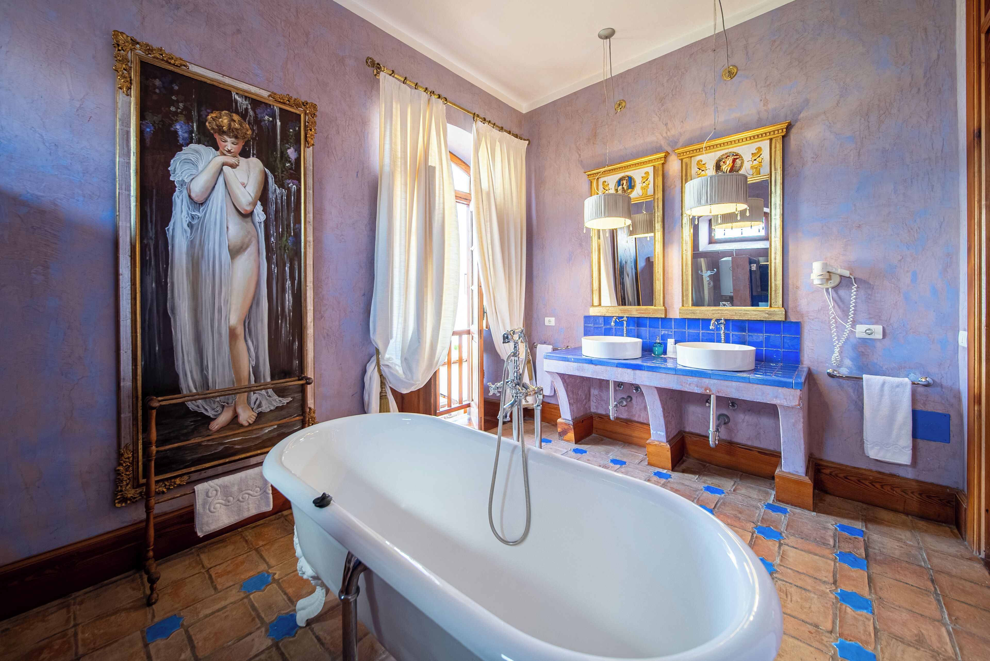 junior studio suite | bathroom | free toiletries, hair dryer, towels