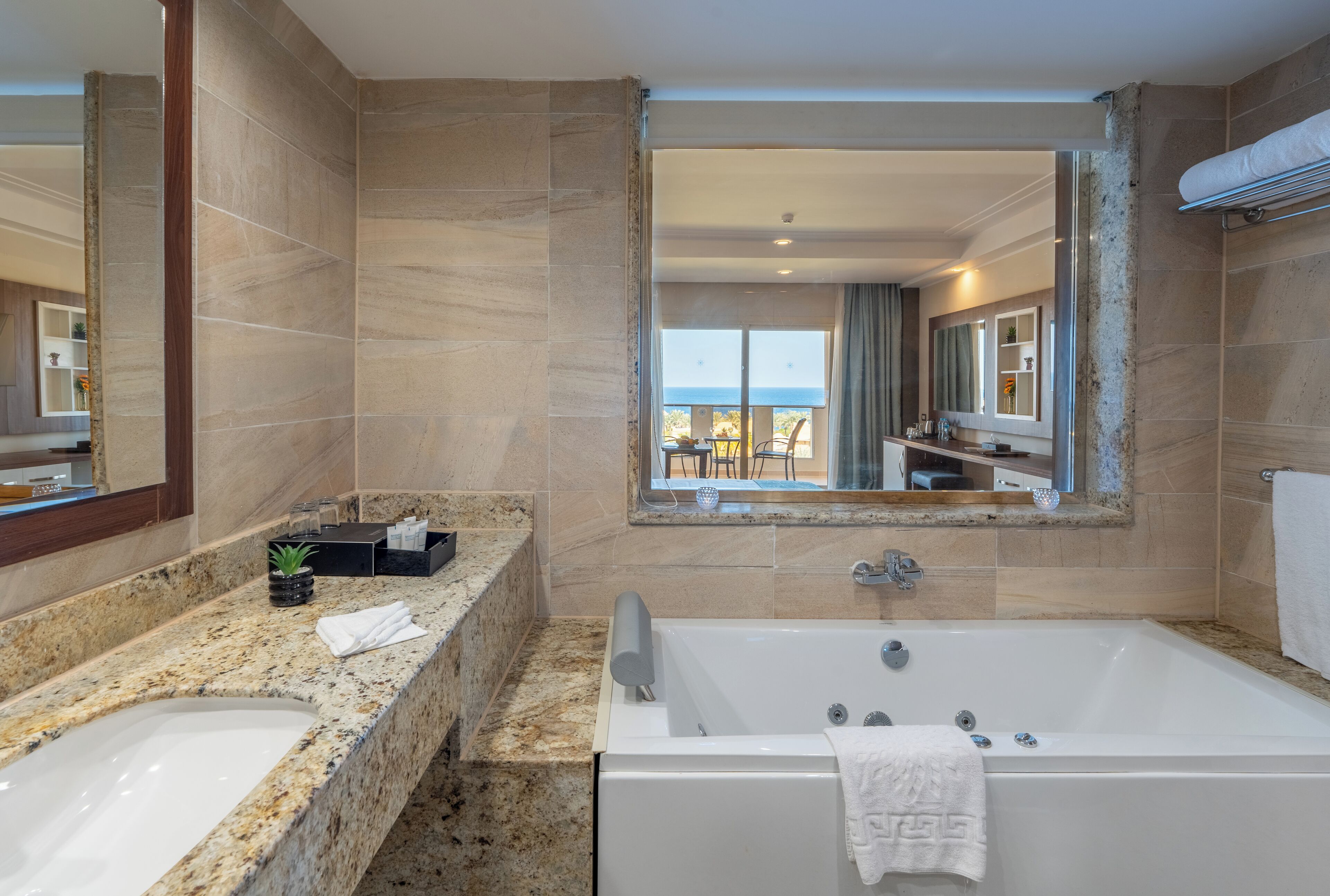 grand club room sea view | bathroom | shower, free toiletries, hair dryer, towels