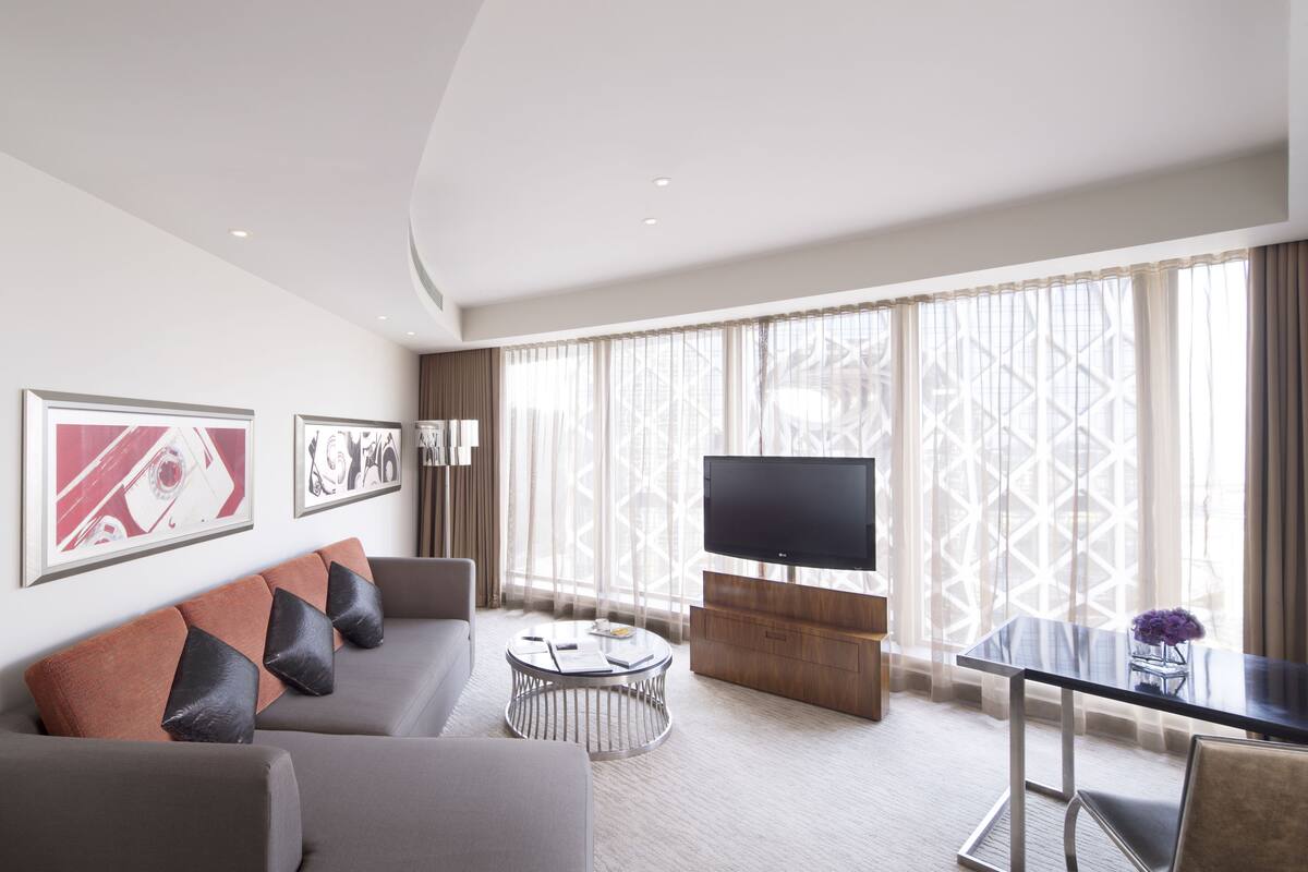 corner suite | living room | 42-inch tv with digital channels, ipod dock