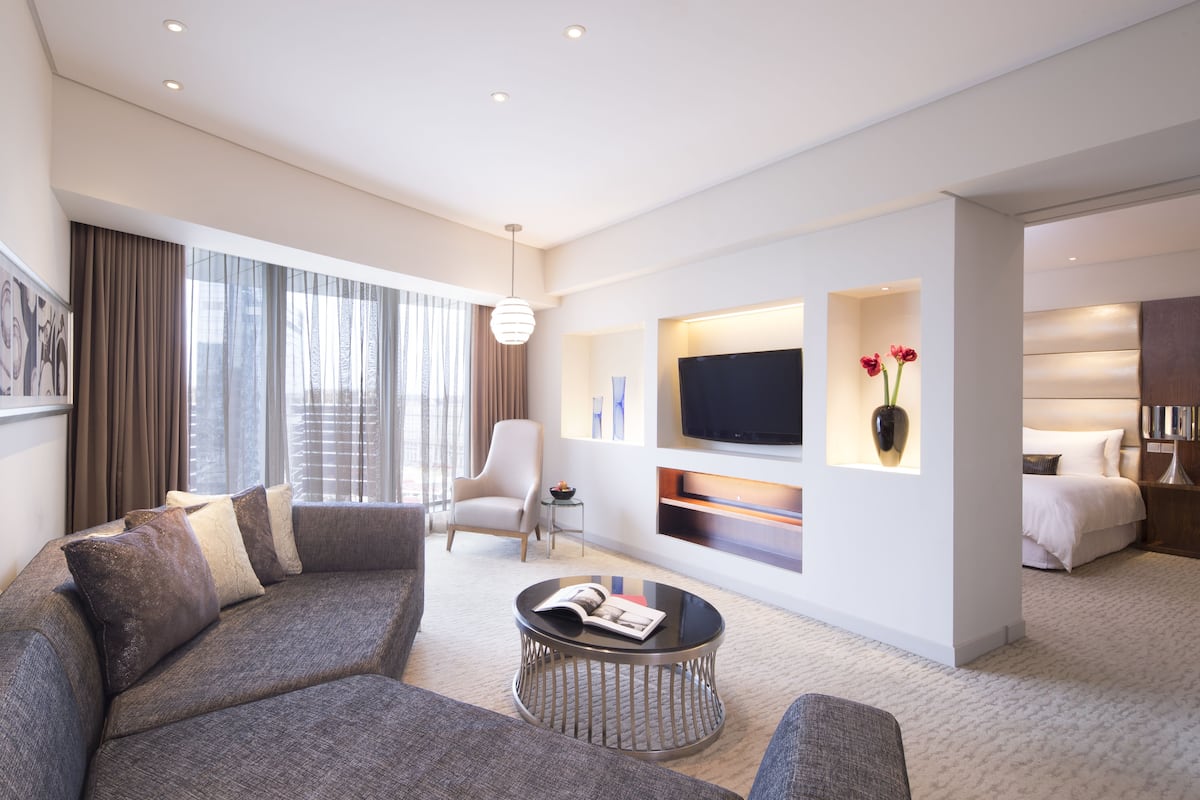 deluxe suite | living room | 42-inch tv with digital channels, ipod dock